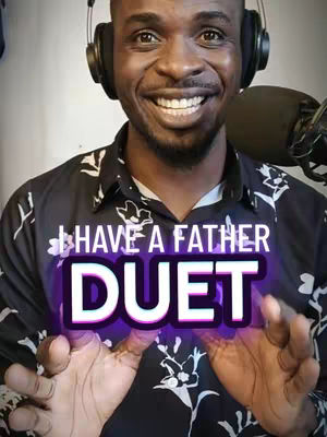 A smiling man with headphones and a patterned shirt is the focal point. Text overlays state 'I HAVE A FATHER' and 'DUET'. A microphone is visible nearby.