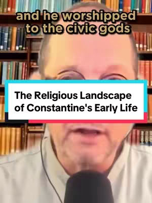 A video cover featuring a man in glasses speaking into a microphone, with text overlays. Behind him is a background of bookshelves. The primary text overlay, set within a turquoise box, reads "The Religious Landscape of Constantine's Early Life." Above him, the text states, "and he worshipped to the civic gods."