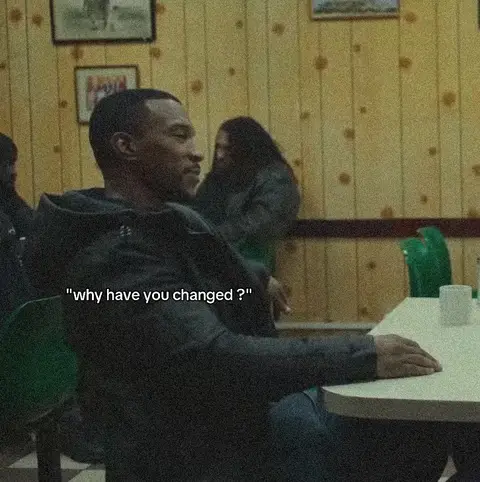 A scene inside a restaurant with two people, one in the foreground looking to the left, and another blurred in the background; hook text overlays the image.