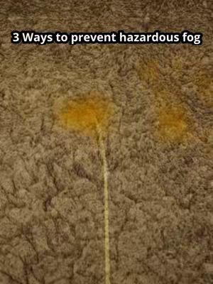 A close-up of a textured surface, predominantly brown with a mix of tan and darker shades. A yellow streak runs vertically down the center, and two patches of a similar yellow color are to the left and right. Text in a white font with a black outline stating '3 Ways to prevent hazardous fog.'