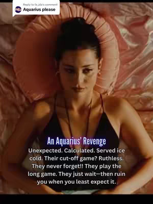 A woman with dark hair is lying on a bed, supported by a pink pillow. She's wearing a black top and has a serious expression. Text overlayed on the image states, "An Aquarius' Revenge" and describes an Aquarius' traits.