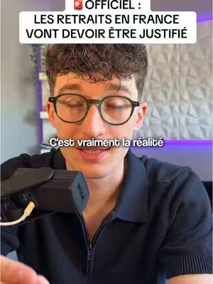 A young man with glasses and a dark shirt is centered in the image, with text overlays at the top and bottom. The background is blurred, suggesting an indoor setting with neutral colors.