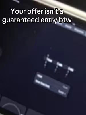 The cover image shows a dark screen with white text at the top. The screen displays some white lines and a menu button. There is overlay text that reads, Your offer isn't a guaranteed entry btw.