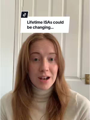 A woman with long red hair is directly facing the camera, against a backdrop of a white door. A white rectangle with overlaid text is above her head.