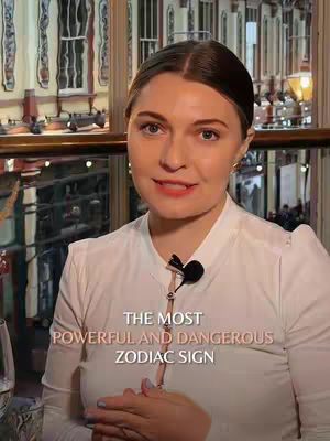 A woman in a white shirt is the focal point, set against an interior background with a window. The image has a neutral, well-lit ambiance.