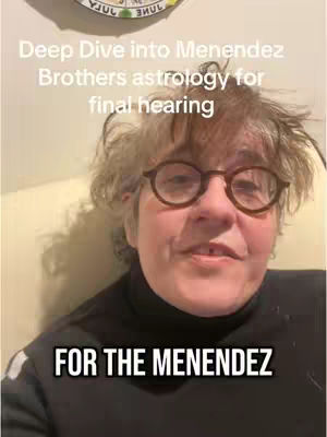 A woman with glasses and short hair is centered in the frame, looking directly at the camera. Text overlays are placed at the top and the bottom.