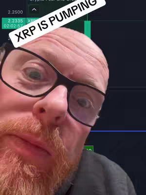A man with glasses and a reddish beard is positioned in front of a dark background. The man has an open mouth and a surprised expression. A white banner with 'XRP IS PUMPING' is across the top left.