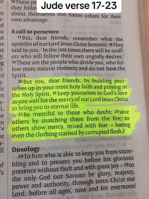 The image is a close-up shot of an open book, with text from a Bible verse highlighted in yellow. The highlighted text is in the middle of the frame. The top of the page has the text "Jude verse 17-23". The layout is simple, with the focus on the text and the highlighted portions.