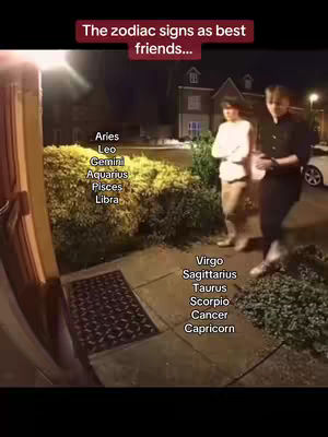 The cover image shows two people standing on a concrete surface, likely a walkway or porch, at nighttime. The light from an external source illuminates the scene, with a hedge adding greenery to the left and other details. Text overlays list the zodiac signs.