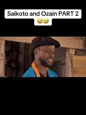 The cover image features a man with a beard wearing a black cap, and an orange and blue top. Above the man is text in a white rectangle that reads "Saikoto and Ozain PART 2" accompanied by two emojis. The background has elements of what looks like wood.
