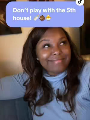 A woman with dark hair is looking up with a slight smile. She is wearing a blue top. Above her is a light purple rectangular text box that reads: Don't play with the 5th house! with three emojis that appear to be of a baby bottle, a baby and a chick.