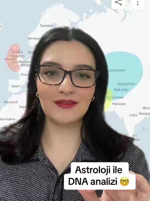 A woman with dark hair and glasses is centered in the image, set against a blurred world map background. Below her, a white box with the text overlay 'Astroloji ile DNA analizi' is shown.