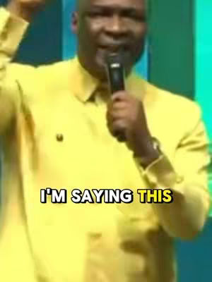 A man wearing a yellow shirt and holding a microphone speaks, with the superimposed text 'I'M SAYING THIS' at the bottom.