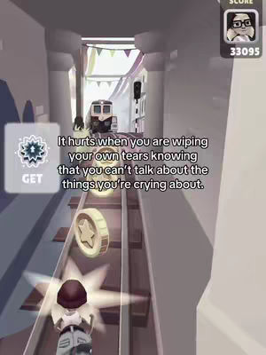 The image features Subway Surfers gameplay. The perspective is a forward-facing view along the track, with the character, a small running avatar, in the foreground. In the background, there is a train coming through a tunnel. Overlay text is present, as are coins, the score, and game UI elements.