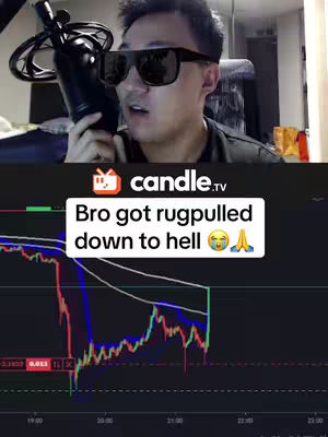 A man wearing sunglasses is holding a microphone and speaking. Below him is a chart that seems to be showing the price of something going down. Text in the middle states Bro got rugpulled down to hell.