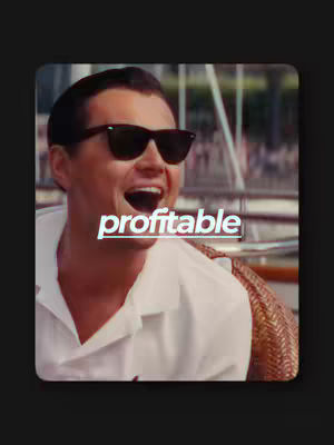 The cover image features a man wearing sunglasses, with an open mouth and a wide smile. The word "profitable" is superimposed on his open mouth. The background appears blurred and includes hints of a waterside setting.