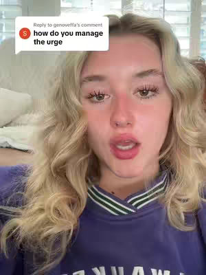 A close-up shot features a young woman with blonde curly hair, angled slightly to the left, in front of a blurred background. She is wearing a purple top and her mouth is open as if she's talking. A comment bubble appears in the corner that reads 'how do you manage the urge'
