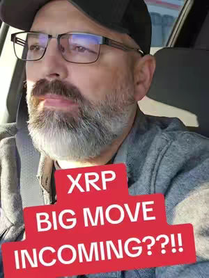 A man wearing glasses and a baseball cap sits in a vehicle, looking sideways.  A red box overlay contains the text 'XRP BIG MOVE INCOMING??!!'.