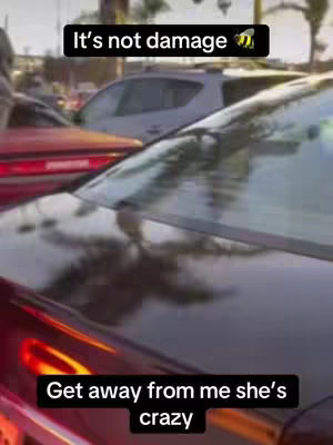 A shot from a car, focusing on its hood, with other vehicles and city elements visible. Overlay text frames the content.