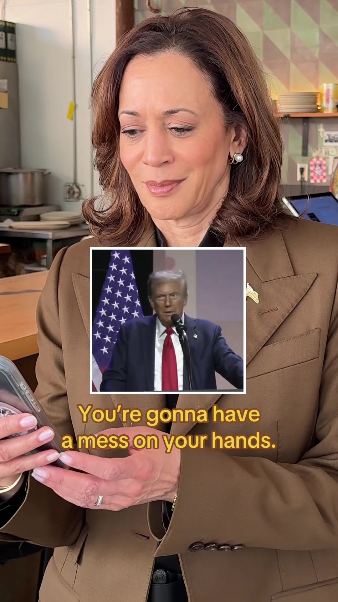 The cover image shows a medium shot of Kamala Harris with her hands close to a phone, and an inset video of Donald Trump speaking at a podium, the overlay text saying "You're gonna have a mess on your hands."