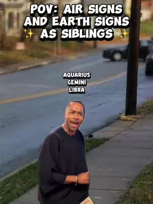 A man with a surprised expression stands on a sidewalk in this video cover image. The background shows a street with parked and moving cars, and a blurred cityscape suggesting an urban setting. Text overlays are positioned across the top and the middle of the image. The man is wearing a dark, plain shirt and a bracelet.