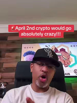 A man in a black cap and glasses speaks earnestly to the camera, with a red banner above mentioning an upcoming event. The background shows a wall, a TV displaying images, and a black chair.