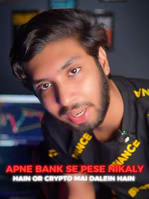 The cover image features a close-up of a man with dark hair and a beard, facing the camera. The text overlayed on the bottom reads 'Apne bank se pese nikaly' and 'Hain or crypto mai dalein hain' in red and white text.