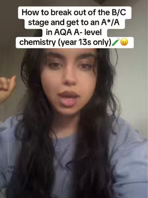A young woman with long dark hair is centered in the frame, looking directly at the camera with an open mouth. Above the hair, a text overlay in a white rectangle proclaims a message, and below the woman, a soft background is visible. The image is well-lit, which accentuates the woman's facial features, and the overall composition has a slightly informal and direct appeal.