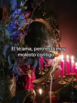 An ornate mirror is the central focus, reflecting a blurry image. Lit candles and flowers are arranged around the mirror, creating a mystical scene with a dark, moody atmosphere. The color palette is dominated by reds, purples, and the warm glow of candles.