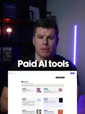 The cover image shows a man in front of a screen displaying a website interface with multiple listed AI tools. The text 'Paid AI tools' is overlaid on the image. Behind the man, additional screens and a neon vertical light are visible. The overall color scheme is dark with purple and yellow highlights.