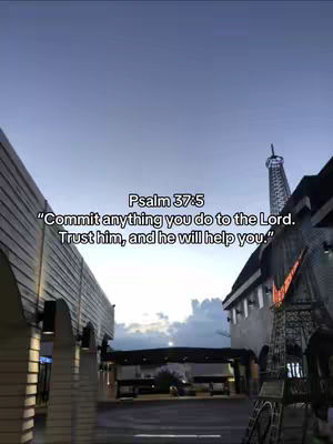 The cover image captures a twilight scene with a clear, gradient sky. Two buildings flank either side, creating a visual tunnel towards the horizon, and a tower-like structure stands in the background. In the foreground, there's a road, and text is overlaid in the center, containing a Bible verse.