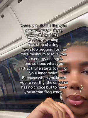 The cover image is a selfie taken inside a vehicle, likely a train or bus, with a woman's face partially visible on the right side. The dominant background colors are light, possibly off-white, and the image contains overlaid text in a sans-serif font. The woman has a nose ring and lip piercing. The composition is centered on the upper body and text.