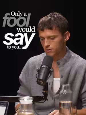 The cover image shows Tom Holland sitting in front of a microphone, appearing to be in a podcast or interview setting. The background is dark. The text "Only a fool would say to you..." appears over the image. There are two bottles with transparent liquids and a tablet on the table.