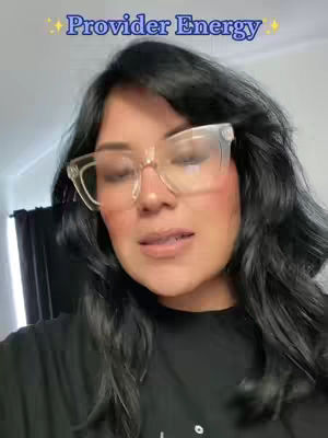 A woman with dark hair and glasses is centered in the frame, facing towards the viewer. Text overlayed on the cover image at the top reads "Provider Energy." The woman is wearing a black shirt and has visible makeup with pink blush. The background is blurred.