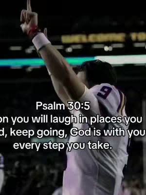 A person in a football jersey with the number 9 raises their right arm to the sky in celebration. Text is overlaid beneath the figure, quoting a bible verse.