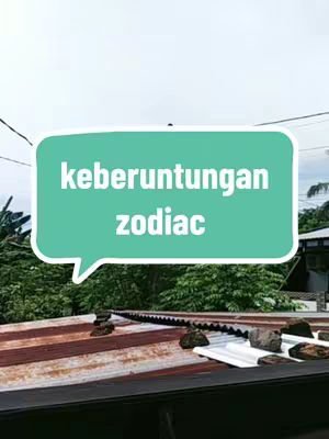 The cover image shows a roof with an aqua speech bubble that says 'keberuntungan zodiac' in white text. The background is a sky and some trees.
