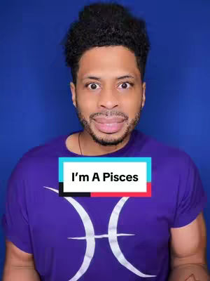 A man with surprised expression, wearing a purple t-shirt with a white Pisces symbol and a text overlay that says "I'm A Pisces". The background is solid blue.