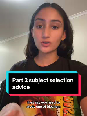A young woman with long dark hair looks directly at the camera. She is wearing a black t-shirt. A rectangular text overlay spans the lower third of the frame.