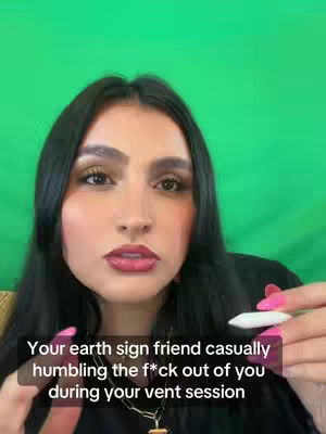 The cover image features a woman with dark, long hair, vibrant makeup, and a green background reminiscent of a chroma key setup. She is centered in the frame, creating a close-up that highlights her facial expressions. Overlaid text at the bottom of the image adds context to the content.