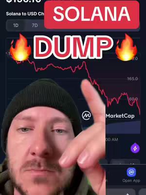 A man in a black beanie is pointing towards a graph on a screen displaying data related to Solana's price, overlaid with large text reading 'SOLANA DUMP'. The graph shows a sharp decline.