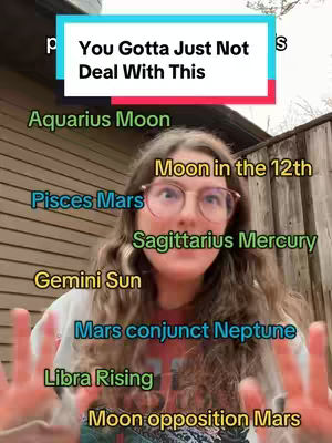 A woman with glasses is centered, with text overlays of astrological terms; she is in front of a wooden wall; text overlay saying, "You Gotta Just Not Deal With This".