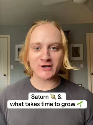 The cover image features a man with light blonde hair and a gray t-shirt, facing forward and speaking. Below him, a white rectangular text box contains the words "Saturn" and the planet symbol, followed by "&" and "what takes time to grow" accompanied by a small sprouting plant icon.