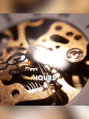 Close-up of a clock mechanism with golden gears. The word "HOURS" is overlaid in white text with a bright light behind it in the center.