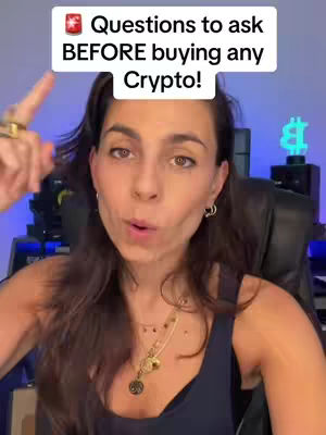 A woman with dark hair in a dark top is pointing to the text overlay. In the background is a blurry blue wall and a neon crypto symbol.