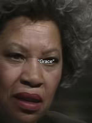 The cover image features a close-up of a woman's face. The woman has dark hair, and red lipstick. The image is of the woman's face in a slightly concerned or thoughtful expression. Overlayed on the image is the word "Grace". The background is dark.