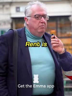 A man in glasses and a blue teal shirt is interviewed. A text overlay on the image states "Rent is". The Emma app logo is at the bottom.