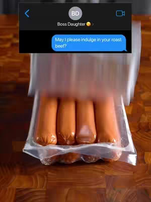 An image featuring a package of hot dogs or sausages, with a screen capture from a text message app. The background is a wooden surface. The screen capture shows a message.
