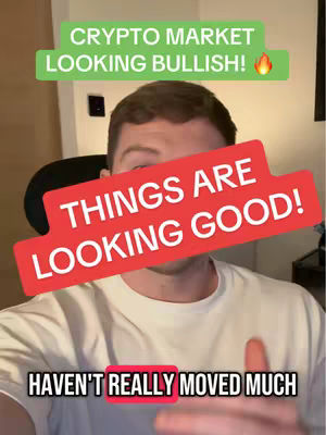 A man is in the center of the frame, wearing a white t-shirt. Above his head is a green banner that reads, 'CRYPTO MARKET LOOKING BULLISH!' with a flame icon. A red rectangle with white text, 'THINGS ARE LOOKING GOOD!' is across his upper body. At the bottom, text reads, 'HAVEN'T REALLY MOVED MUCH,' with 'REALLY' highlighted in red.