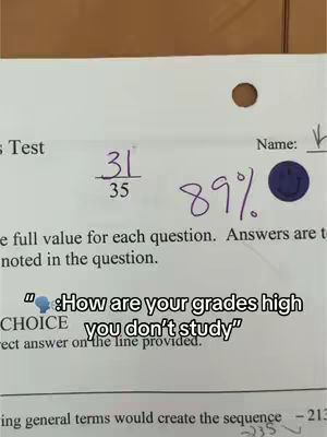 The image is a close-up shot of a test paper with a score of 31/35 (89%) circled, with a smiley sticker next to it and a text overlay questioning how good the grades are despite not studying. The paper is white with black text and purple handwriting.