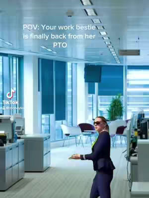 A professional office environment. A woman with black sunglasses, wearing a black blazer and business attire, walks toward the camera in a bright open office space. The text overlay reads, "POV: Your work bestie is finally back from her PTO."